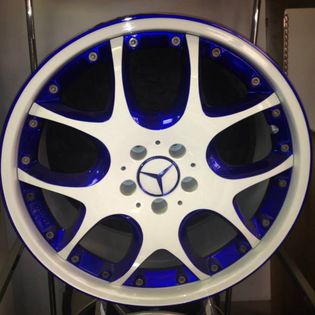 A beautiful Candy blue and white custom painted Mercedes-Benz wheel